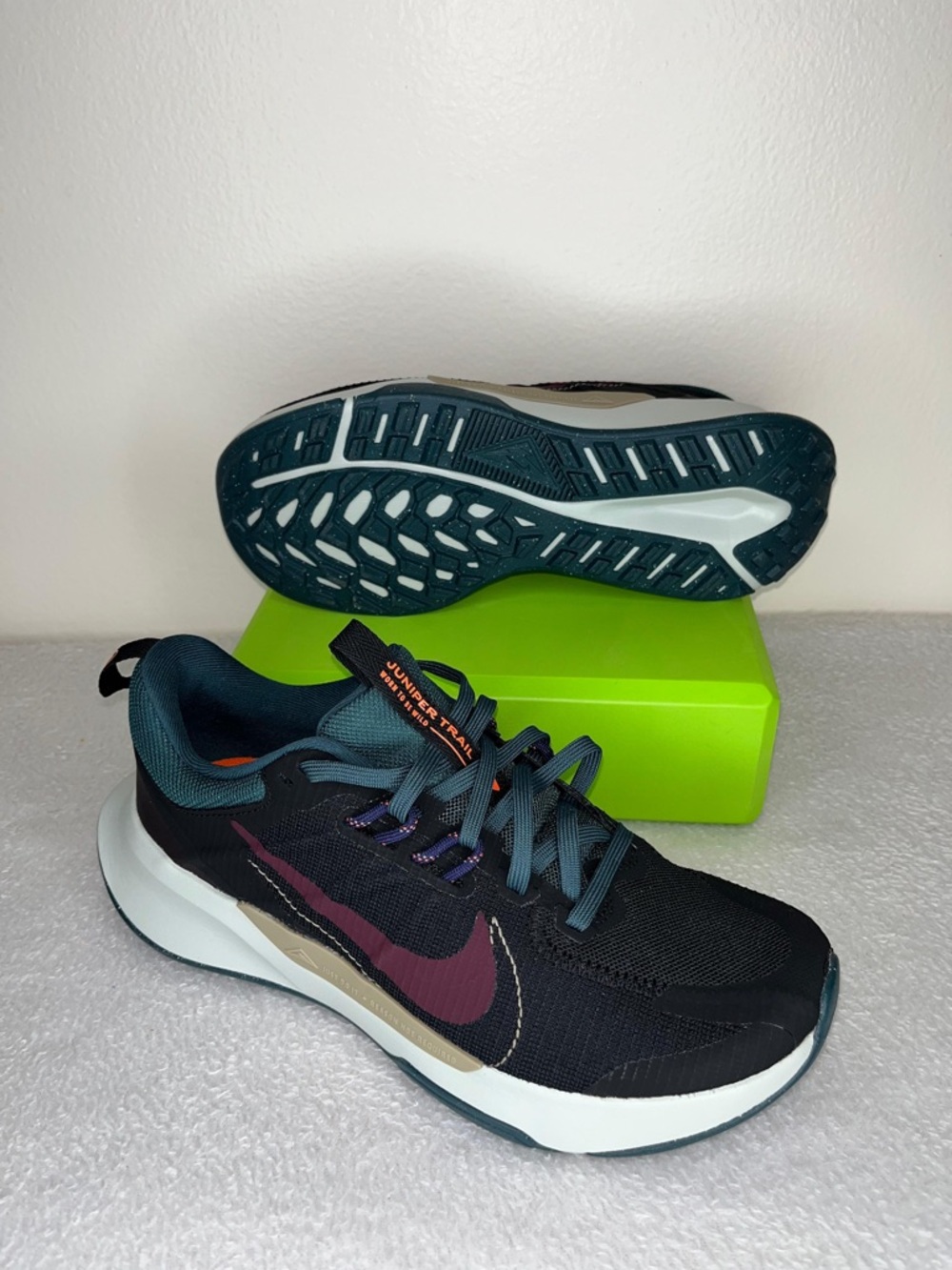 Nike Black Running Shoes with Burgundy Swoosh and Teal Accents